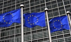 European Union flags fly in front of the European Commission headquarters in Brussels