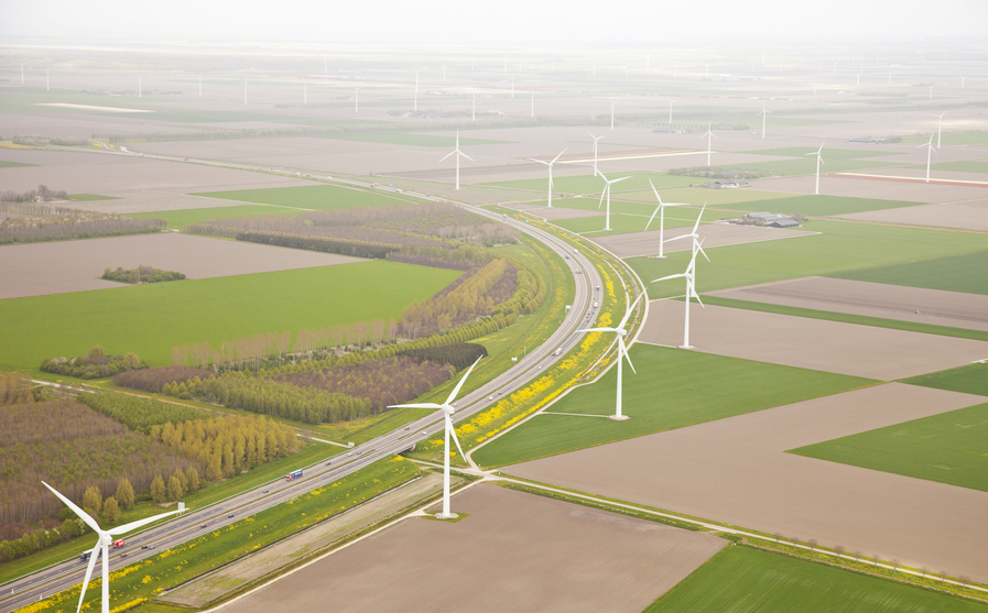 Dutch farm landscape with windmills and road from above, The Netherlands