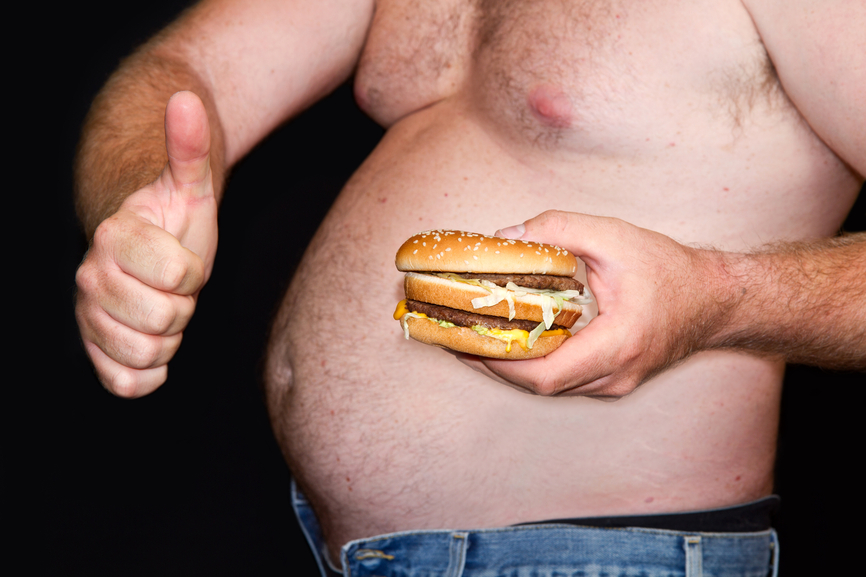Fat man with hamburger
