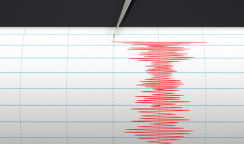 Seismograph instrument recording ground motion during earthquake