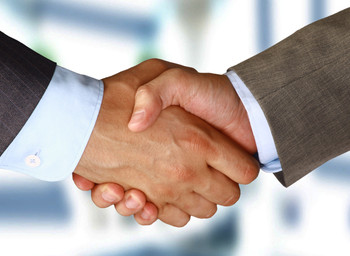 Two businessman shaking hands