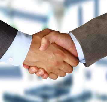 Two businessman shaking hands