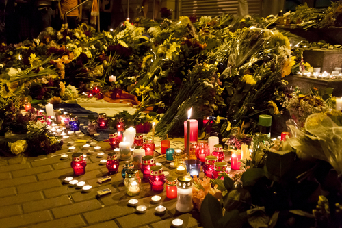 People place flowers at Dutch embassy in Kyiv