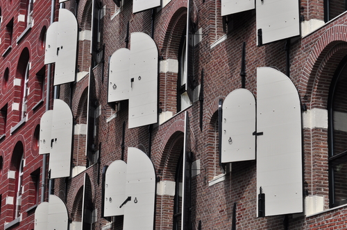 White wooden shutter on Amsterdam houses