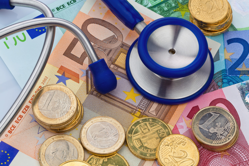 stethoscope and banknotes