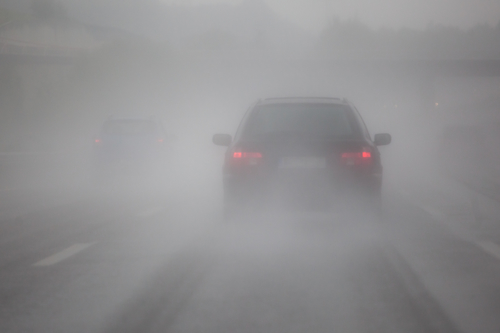 car in fog