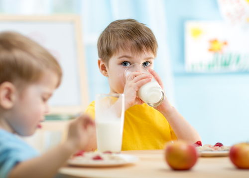 children eating healthy food at home