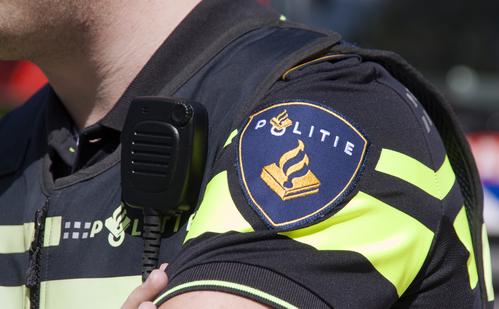 Dutch police badge and radio walkie talkie