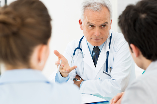 Doctor discussing with patients