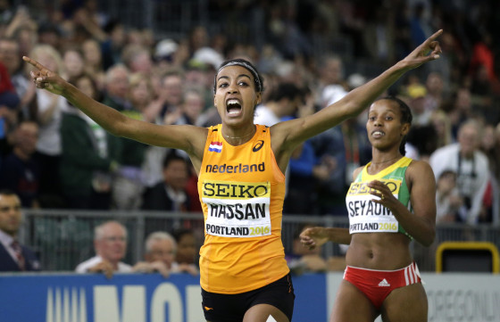 Sifan Hassan crosses the finishing line to take the world indoor 1,500 metres title. Photo: AP Photo/Elaine Thompson