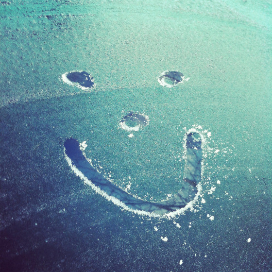 Smiley face on frozen windscreen
