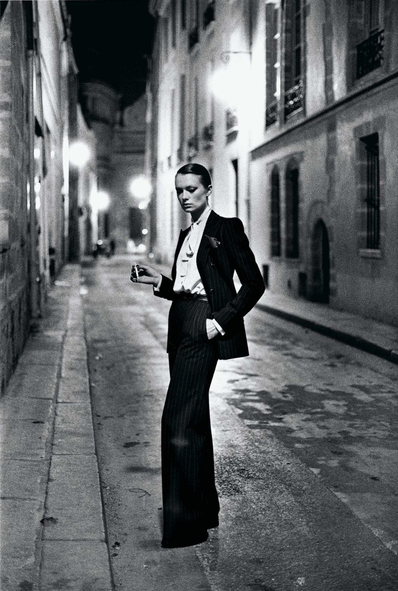 Photo: Yves Saint Laurent, French Vogue, Rue Aubriot, Paris 1975 © Helmut Newton / Helmut Newton Estate 
