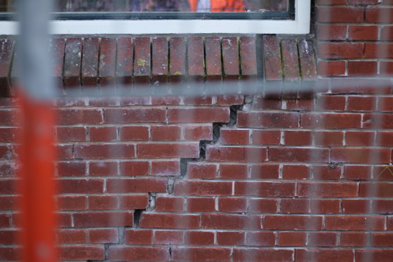Cracks in the wall of a property damaged by earthquakes. Photo: Graham Dockery