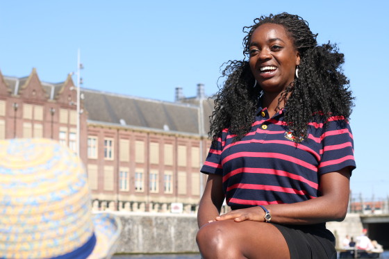 Tour guide Stacyian tells stories of how Amsterdam was built. Photo: Graham Dockery