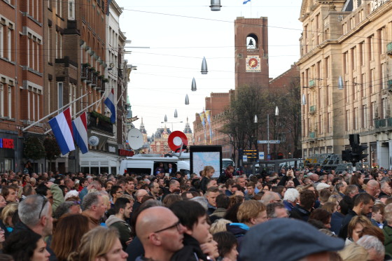 Thousands of people packed on to the Dam to remember those who died. Photo: Graham Dockery