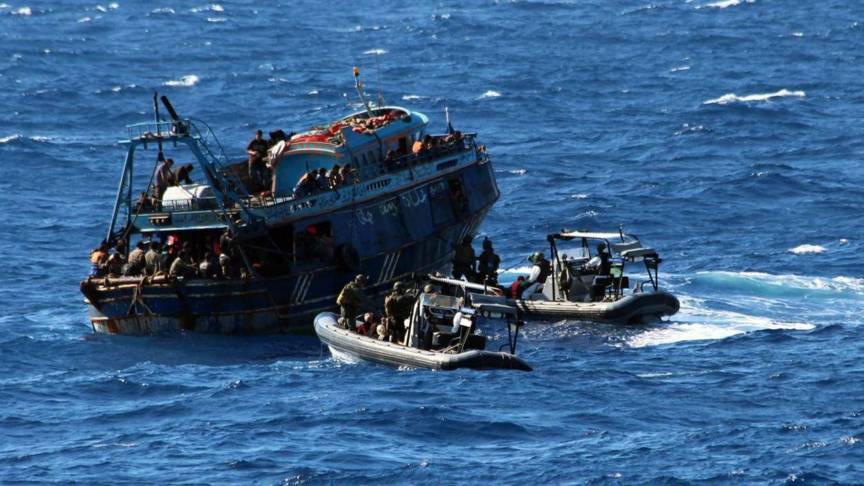 Two smaller boats bring the asylum seekers to safety. Photo: Defensie.nl