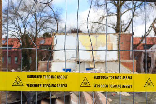 'No trespassing asbestos' at a demolition site. Photo: Depositphotos.com