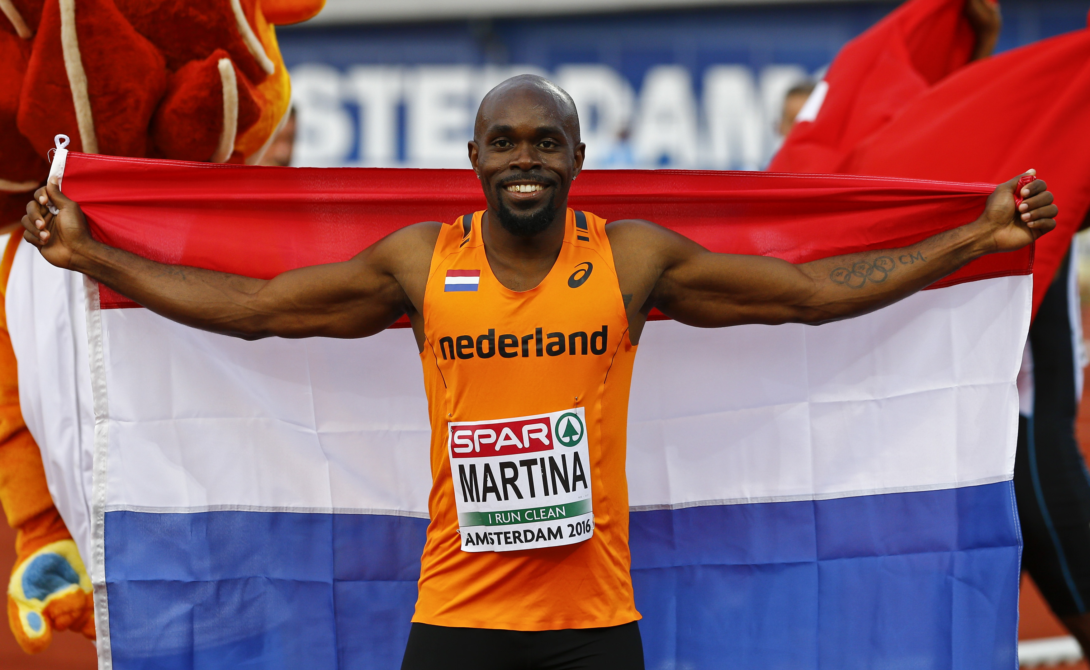 Churandy Martina celebrates his win in the 100m at the European athletics championships. Photo: Reuters
