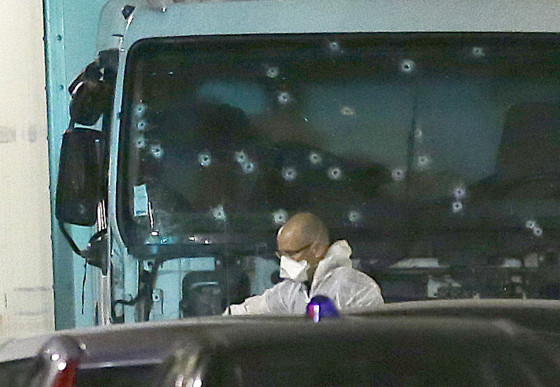 The windscreen of the attack lorry riddled with bullets. Photo: AP Photo/Claude Paris