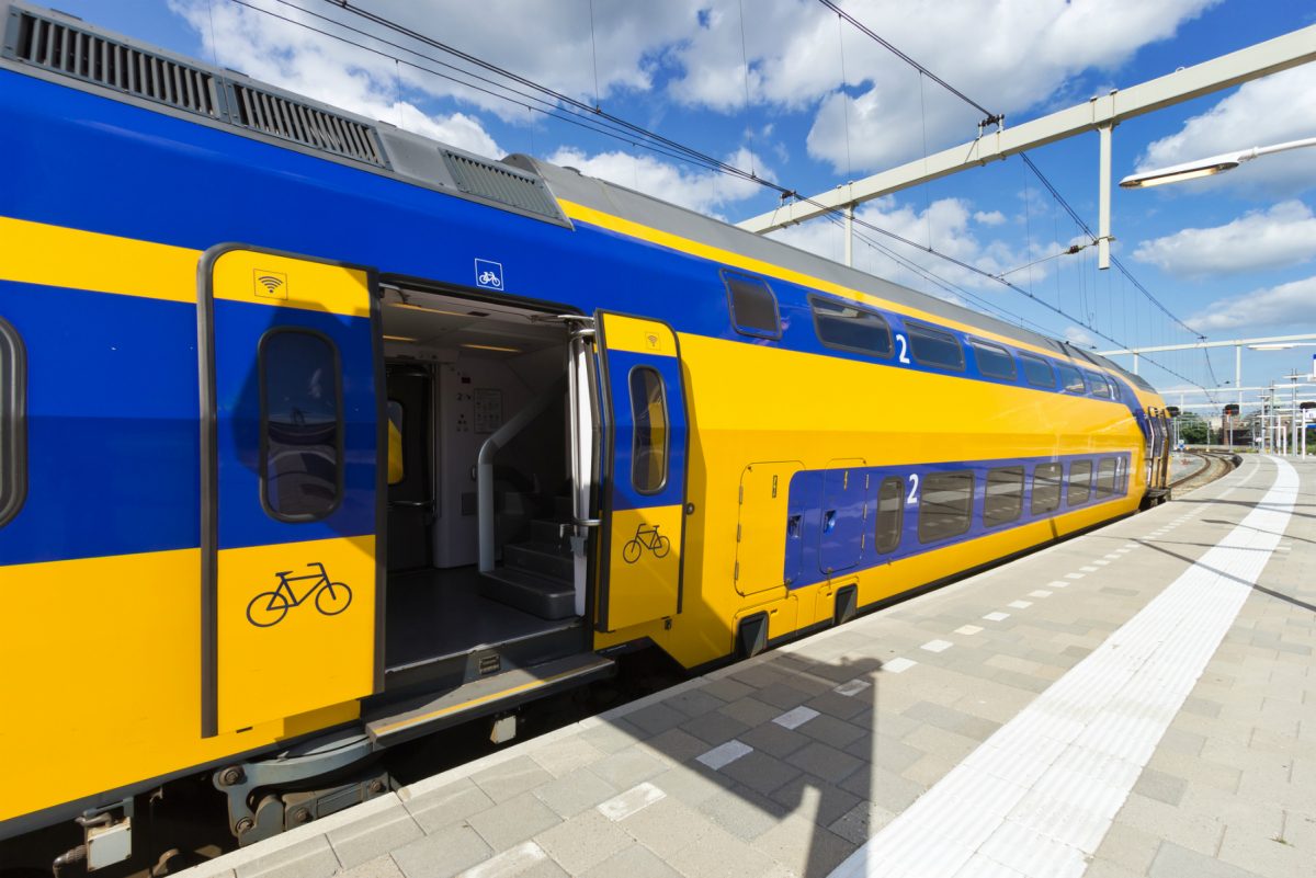 Image of NS double decker Dutch train sitting in station