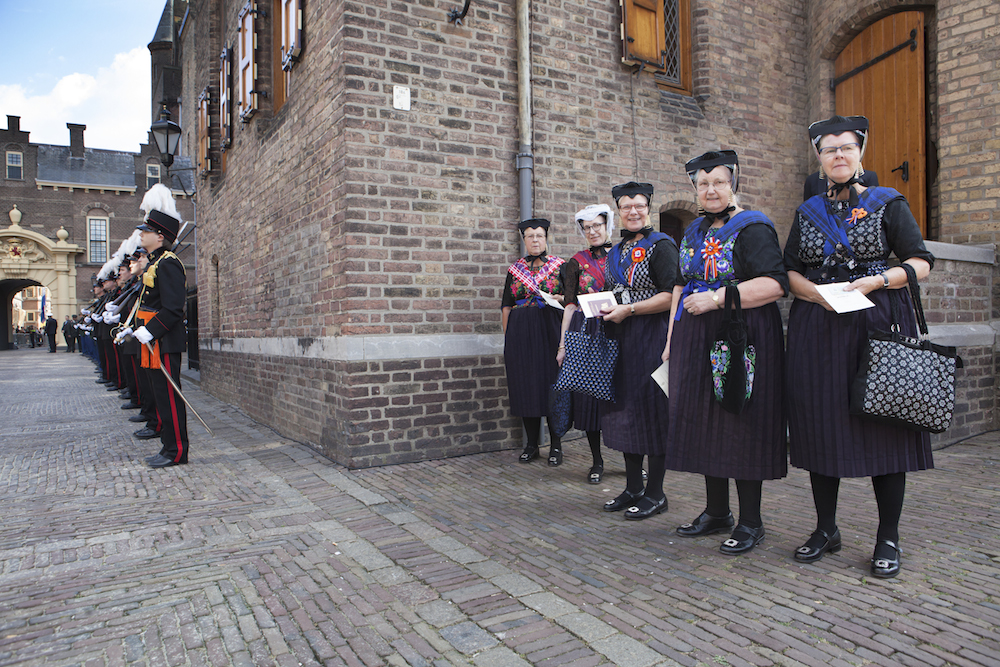 Ladies from Staphorst wait for the royal procession outside parliament. Photo: Maarten Hartman