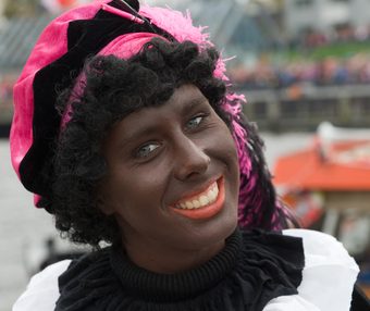 ENSCHEDE, THE NETHERLANDS - NOV 14, 2015: Black Pete is the helping hand of the dutch Sinterklaas