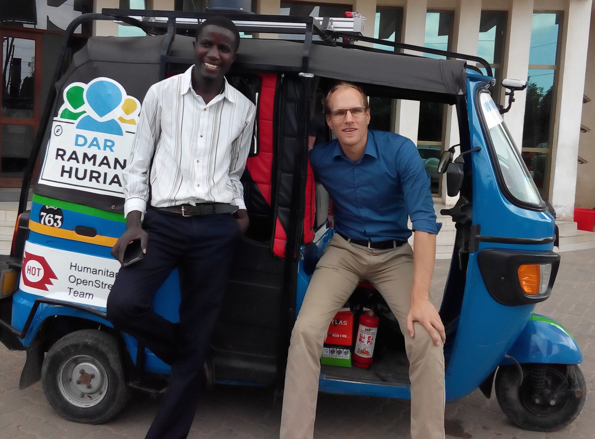 Map maker Paul Uithol (right) in Dar es Salaam, Tanzania