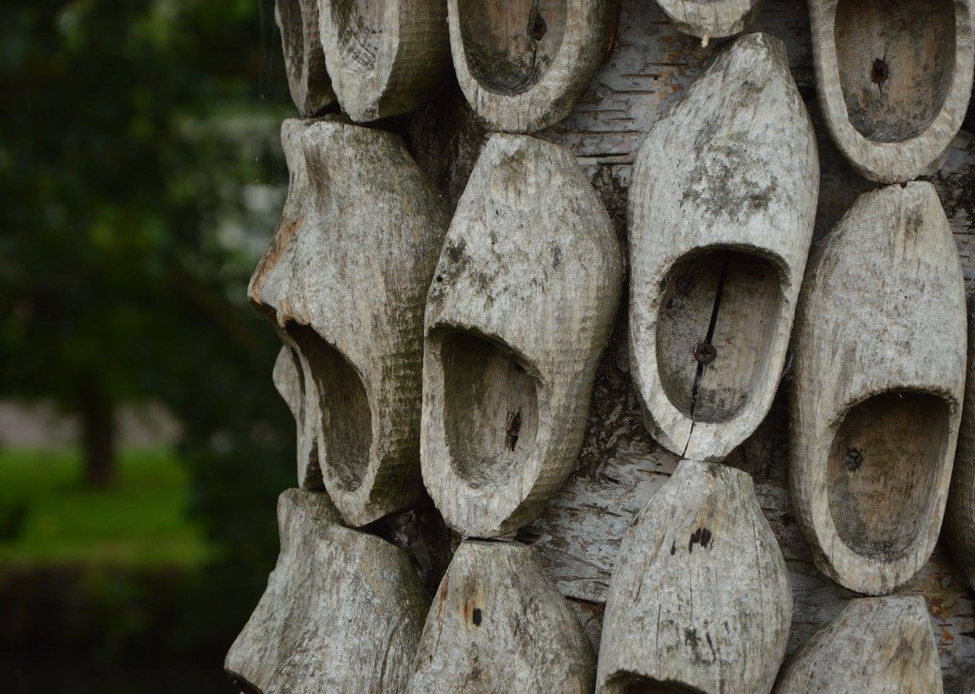 wooden clogs nailed to plank