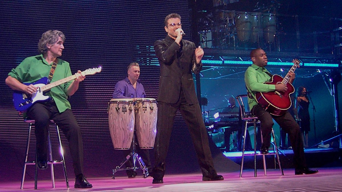 George Michael singing on stage in Munich in 2006.