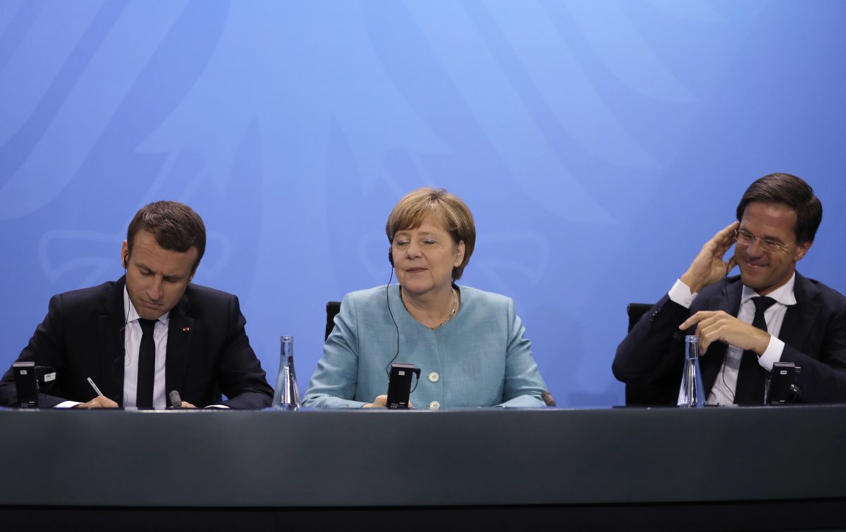 French president Emmanuel Macron, German chancellor Angela Merkel and Dutch prime minister Mark Rutte