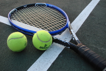 Tennis racket and balls.