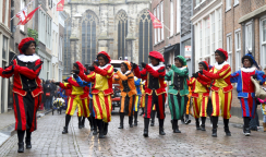 Dancers dressed as Zwarte Piet