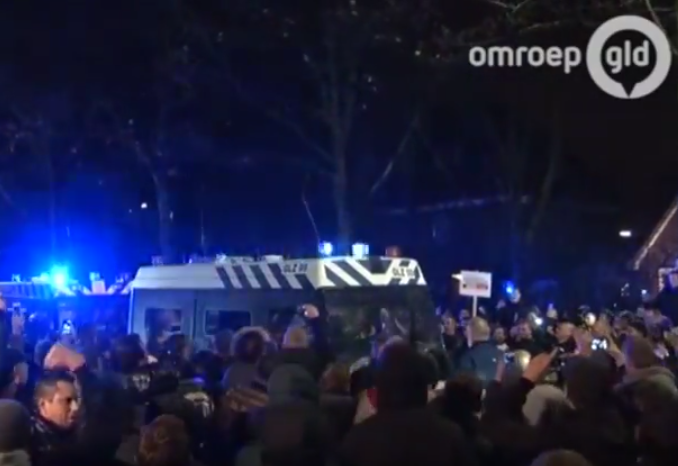 Dutch police fire warning shots during riots over refugee centre ...