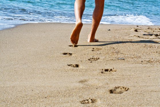 Feet on beach, summer, warm weather