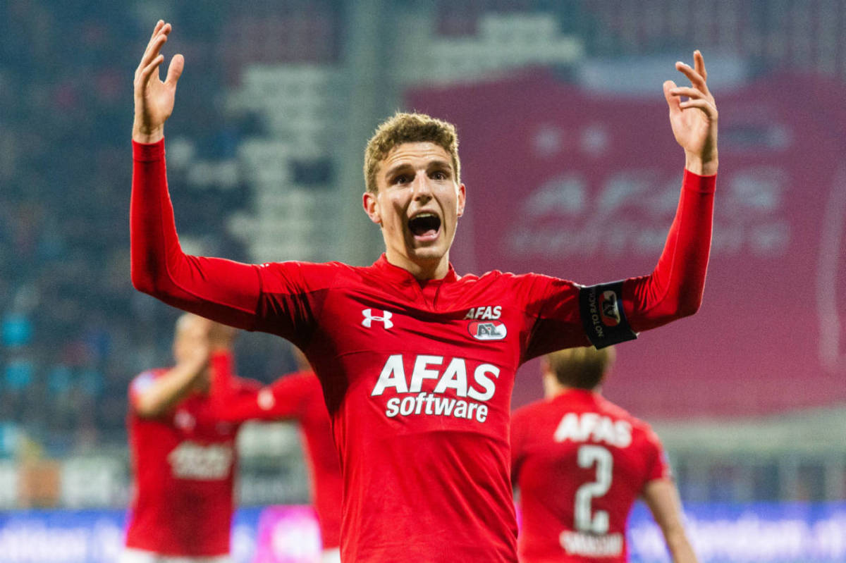 Guus Til of AZ Alkmaar raises his arms to celebrate scoring the opening goal against VVV Venlo.