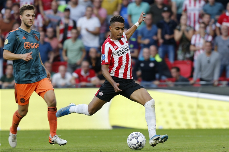 Donyell Malen shaping to shoot against Ajax.