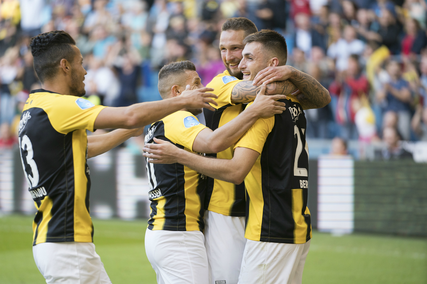 Matus Beto celebrates his winning penalty for Vitesse with Oussama Darfalou and Bryan Linssen