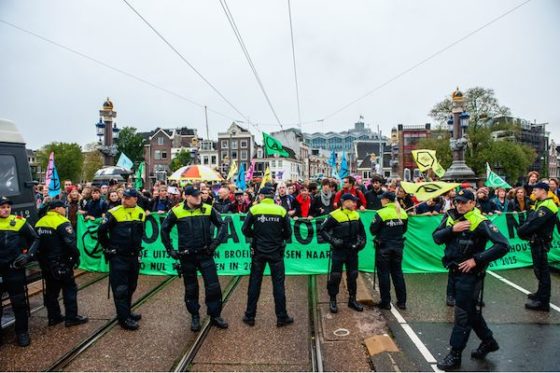 130 arrests as Extinction Rebellion activists block key Amsterdam ...