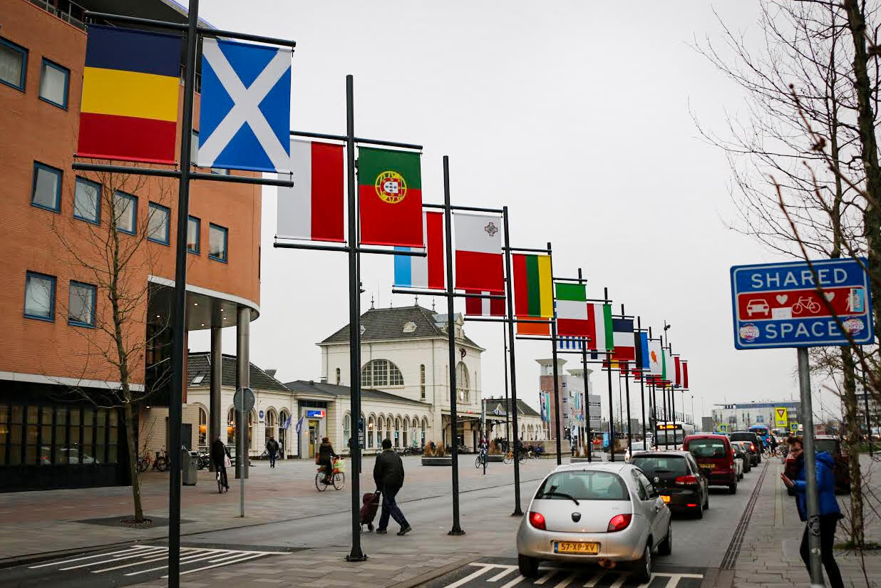 The Scottish saltire in the parade of EU flags outside Leeuwarden station.