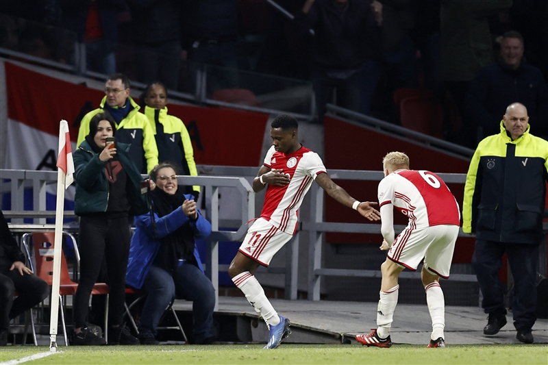 Quinsy Promes dances by the corner flag to celebrate his 35-minute goal.