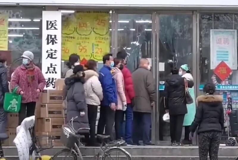 People queuing for supplies in Wuhan