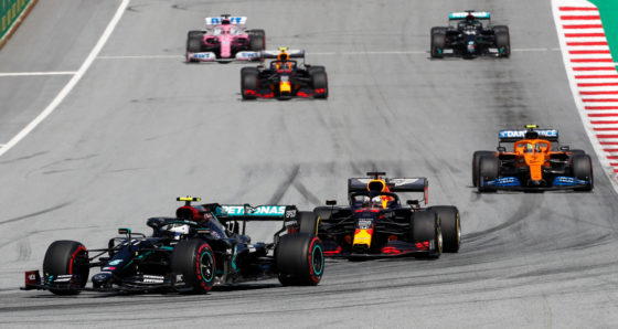 Max Verstappen running in second place on the first lap of the race
