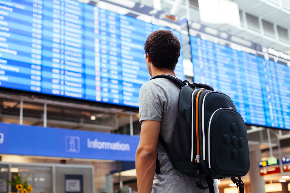 A passenger in an airport terminal