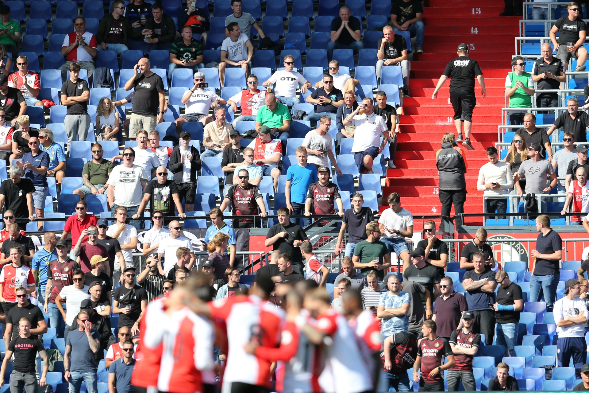 Feyenoord players during Saturday's game in front of a stand full of supporters.