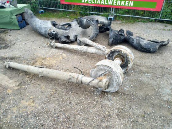 The burst tyre and landing gear laid out at the recovery site.
