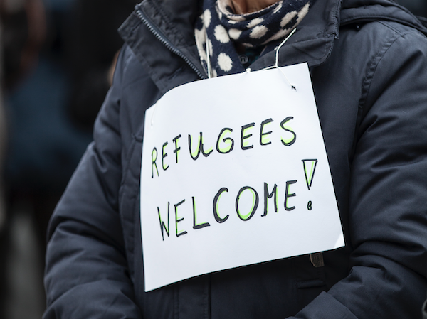 A shared home for refugees is "not basic enough" for minister