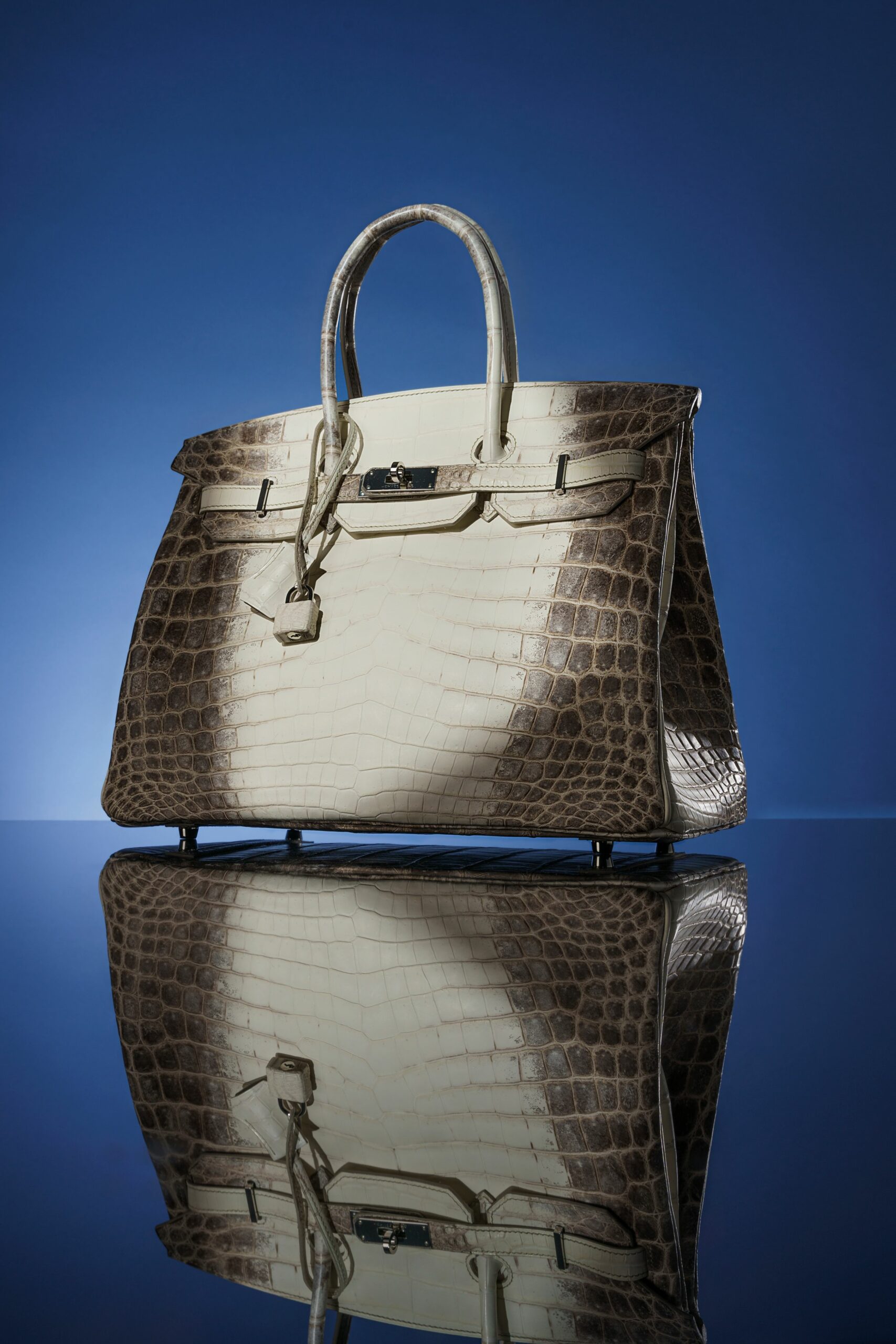 Past auction: Black alligator Hermes clutch purse